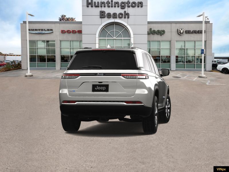 2023 Jeep Grand Cherokee 4xe Base 4x4 in a Bright White exterior color and Global Blackinterior. BEACH BLVD OF CARS beachblvdofcars.com 