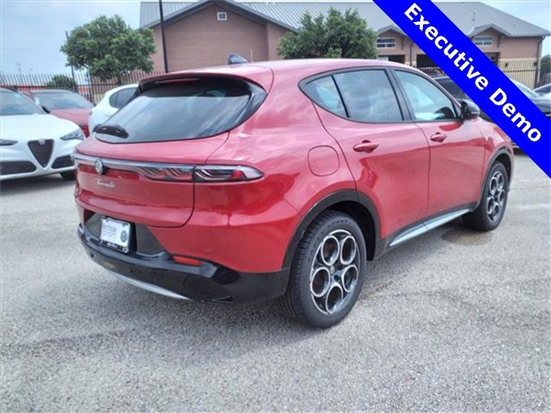 2024 Alfa Romeo Tonale Ti in a Alfa Rosso exterior color and Tan/Blackinterior. Northside Imports Houston 281-475-4549 northsideimportshouston.com 