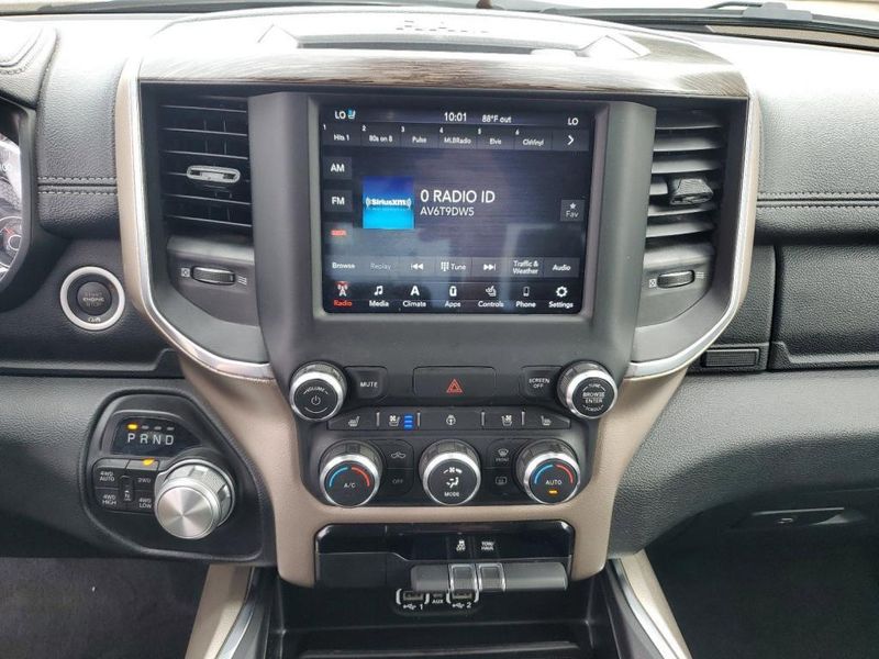 2020 RAM 1500 Laramie in a Bright White Clear Coat exterior color and Blackinterior. Johnson Dodge 601-693-6343 pixelmotiondemo.com 