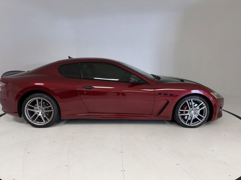 2018 Maserati GranTurismo MC in a Rosso Trionfale Metallic exterior color and Bianco Pregiatointerior. Karma Newport Beach (844) 527-6262 karmanb.com 