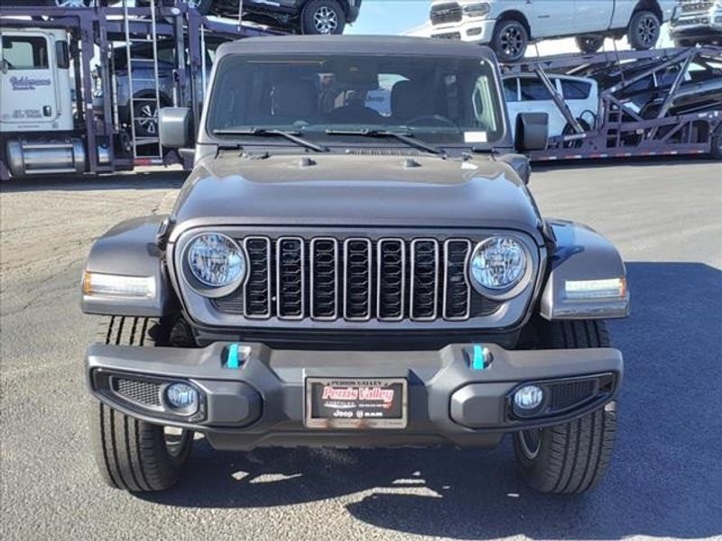 2024 Jeep Wrangler Sport S 4xe in a Granite Crystal Metallic Clear Coat exterior color and Blackinterior. Perris Valley Auto Center 951-657-6100 perrisvalleyautocenter.com 