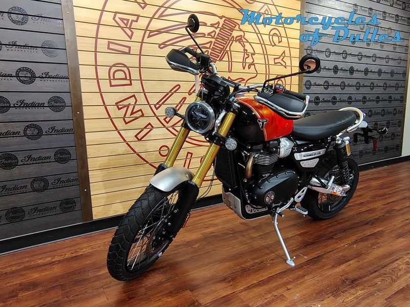 2024 Triumph Scrambler 1200 XE  in a Baja Orange/Phantom Black exterior color. Motorcycles of Dulles 571.934.4450 motorcyclesofdulles.com 