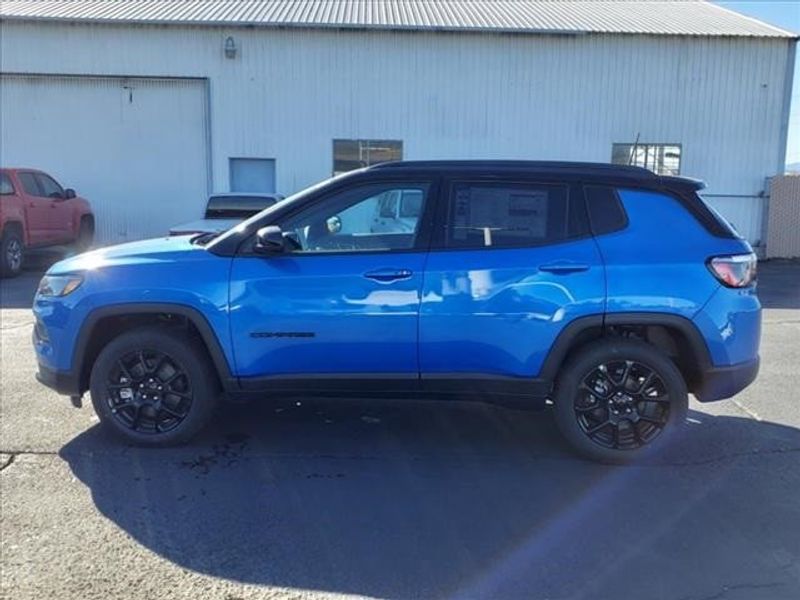 2024 Jeep Compass Latitude 4x4 in a Laser Blue Pearl Coat exterior color and Blackinterior. Perris Valley Chrysler Dodge Jeep Ram 951-355-1970 perrisvalleydodgejeepchrysler.com 