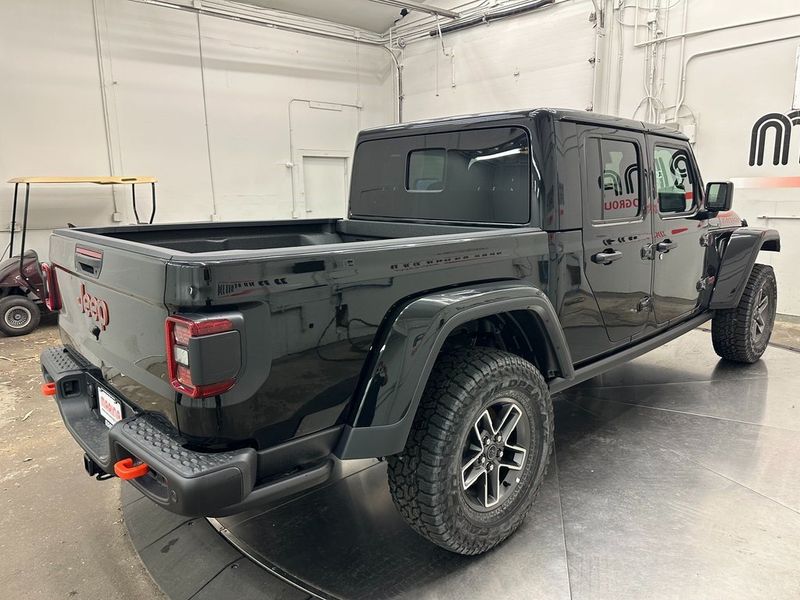 2024 Jeep Gladiator Mojave X 4x4 in a Black Clear Coat exterior color. Marina Chrysler Dodge Jeep RAM (855) 616-8084 marinadodgeny.com 