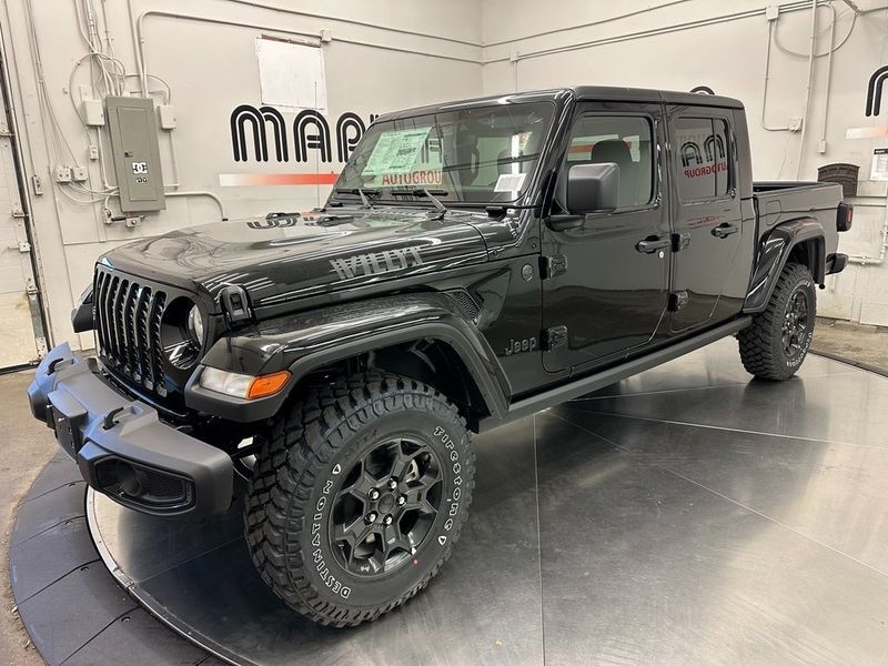 2023 Jeep Gladiator Willys 4x4 in a Black Clear Coat exterior color and Blackinterior. Marina Auto Group (855) 564-8688 marinaautogroup.com 