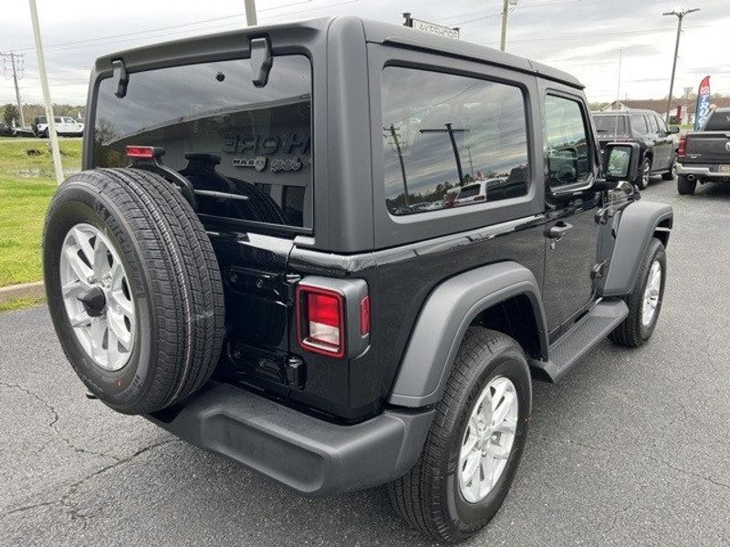 2023 Jeep Wrangler 2-door Sport S 4x4 in a Black Clear Coat exterior color and Blackinterior. Lakeshore CDJR Seaford 302-213-6058 lakeshorecdjr.com 