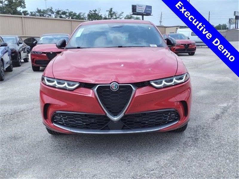 2024 Alfa Romeo Tonale Ti Eawd in a Alfa Rosso (Red) exterior color and Tan/Blackinterior. Northside Alfa Romeo of Houston 281-475-4549 alfaromeousaofnorthhouston.com 