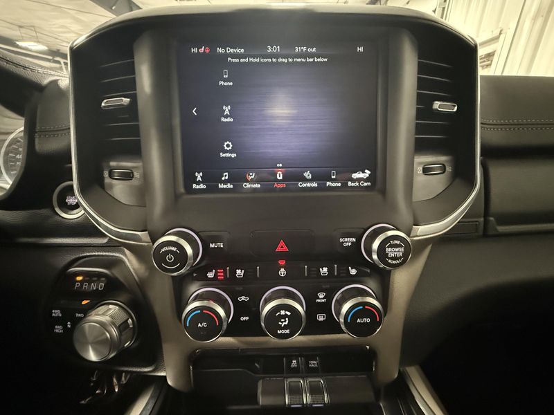 Used 2020 RAM 1500 Laramie in a Bright White Clear Coat exterior color and Blackinterior. Thys Motor Company 319-318-6640 thysmotorco.com 