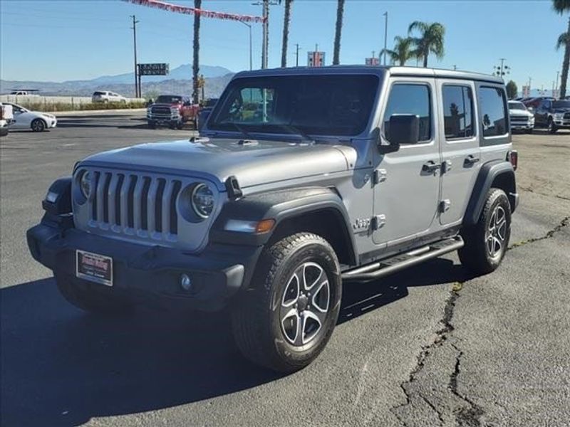 2020 Jeep Wrangler Unlimited Sport S in a Billet Silver Metallic Clear Coat exterior color and Blackinterior. Perris Valley Kia 951-657-6100 perrisvalleykia.com 