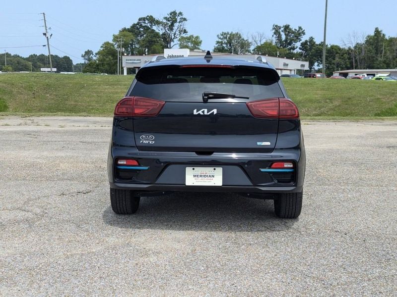 2022 Kia Niro EV EX Premium in a Gravity Blue exterior color and Charcoalinterior. Johnson Dodge 601-693-6343 pixelmotiondemo.com 