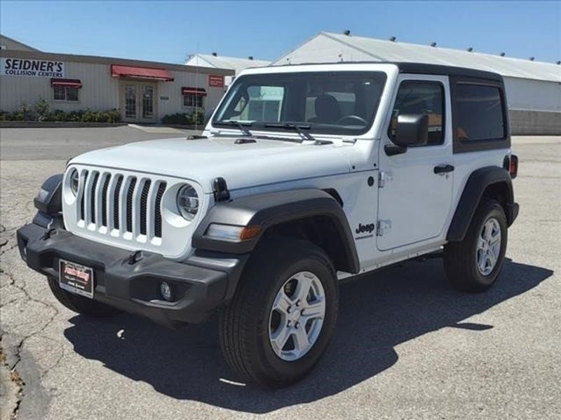 2022 Jeep Wrangler Sport S in a Bright White Clear Coat exterior color and Blackinterior. Perris Valley Auto Center 951-657-6100 perrisvalleyautocenter.com 