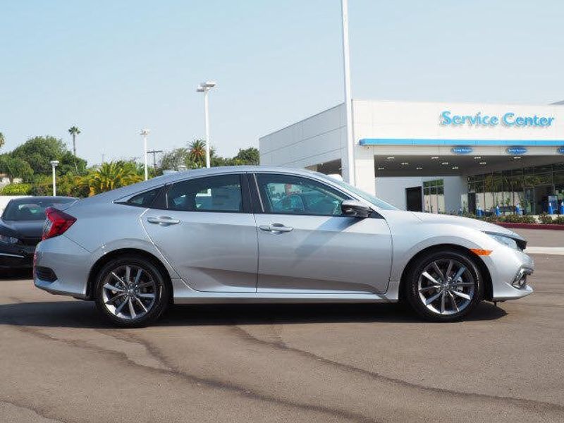 2020 Honda Civic Sedan EX in a Lunar Silver Metallic exterior color and Blackinterior. BEACH BLVD OF CARS beachblvdofcars.com 