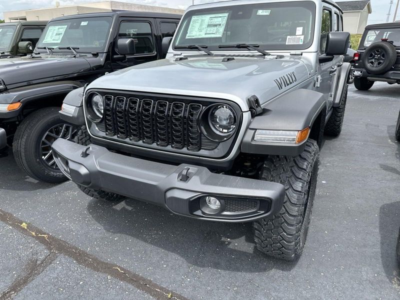 2024 Jeep Wrangler 4-door Willys in a Silver Zynith Clear Coat exterior color and Blackinterior. Gupton Motors Inc 615-384-2886 guptonmotors.com 