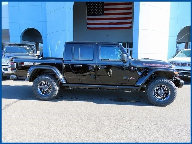 2024 Jeep Gladiator MOJAVE X 4X4 in a Black Clear Coat exterior color. Papas Jeep Ram In New Britain, CT 860-356-0523 papasjeepram.com 