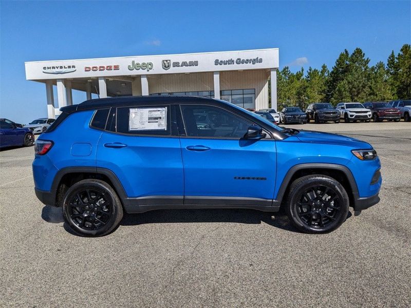 2023 Jeep Compass Altitude 4x4 in a Laser Blue Pearl Coat exterior color and Blackinterior. South Georgia CDJR 229-443-1466 southgeorgiacdjr.com 