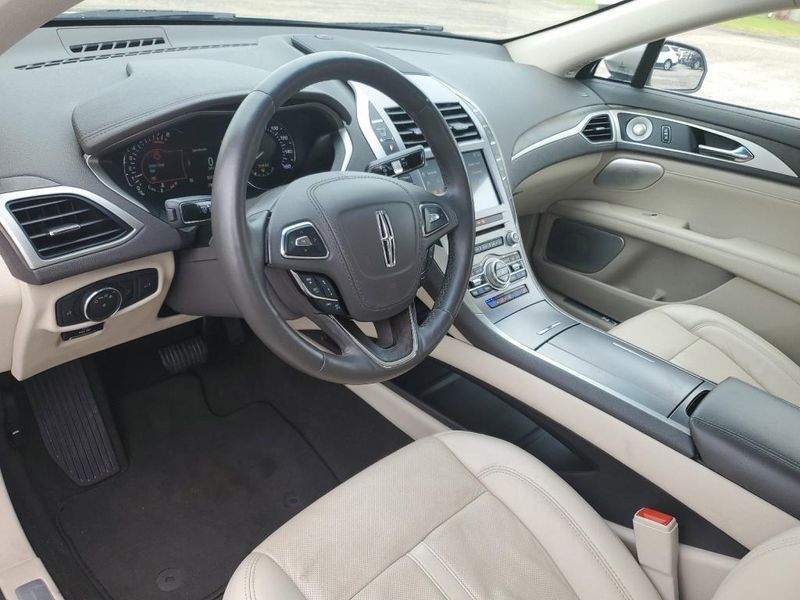 2020 Lincoln MKZ Reserve in a BROWN exterior color. Johnson Dodge 601-693-6343 pixelmotiondemo.com 