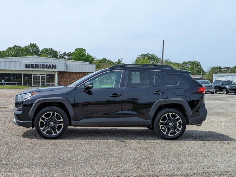 2021 Toyota RAV4 Adventure in a Midnight Black Metallic exterior color. Johnson Dodge 601-693-6343 pixelmotiondemo.com 