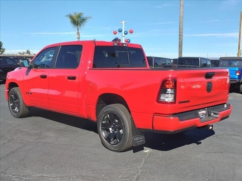 2024 RAM 1500 Big Horn Lone Star in a Flame Red Clear Coat exterior color and Blackinterior. Perris Valley Auto Center 951-657-6100 perrisvalleyautocenter.com 