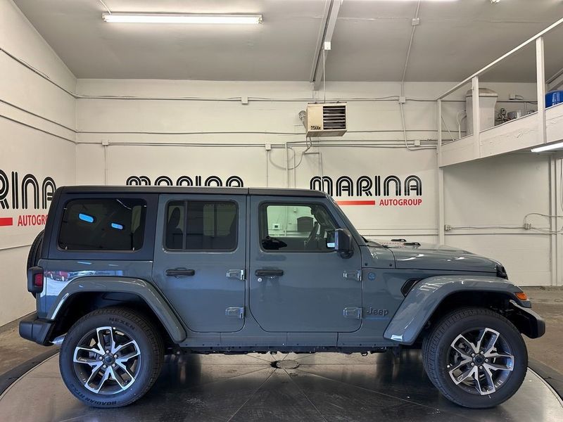 2024 Jeep Wrangler 4-door Sport S 4xe in a Anvil Clear Coat exterior color and Blackinterior. Marina Auto Group (855) 564-8688 marinaautogroup.com 