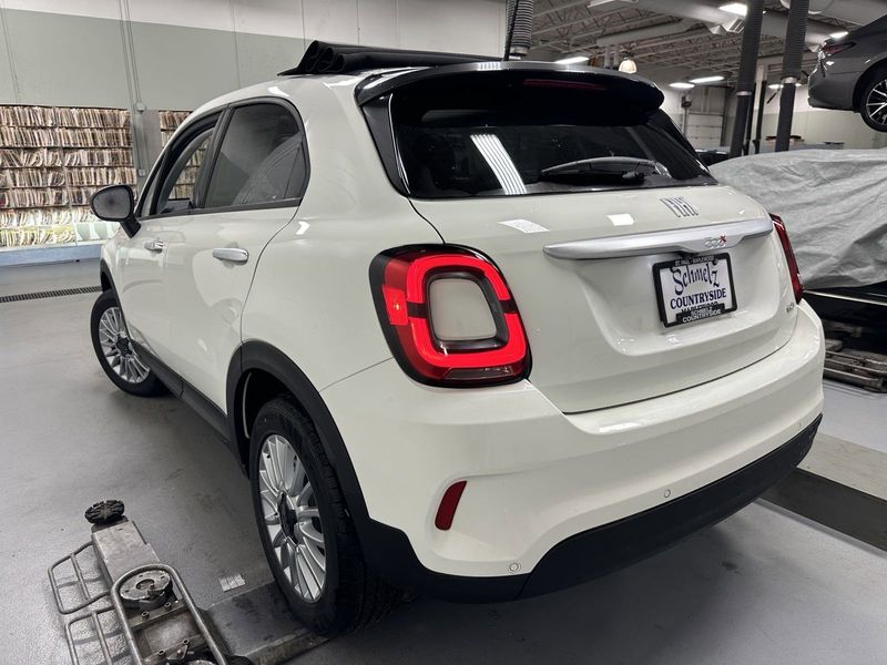 2023 Fiat 500x Pop Awd in a Bianco Gelato (White Clear Coat) exterior color and Blackinterior. Schmelz Countryside Alfa Romeo and Fiat (651) 968-0556 schmelzfiat.com 