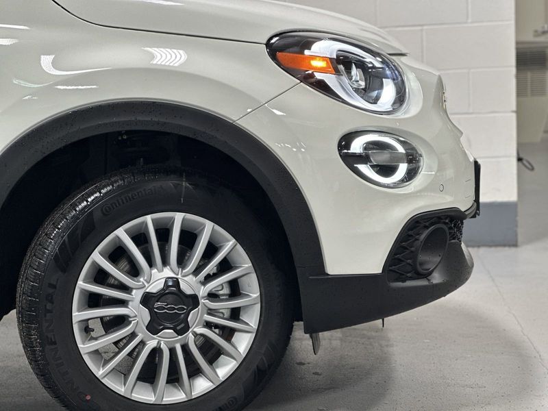 2023 Fiat 500x Pop Awd in a Bianco Gelato (White Clear Coat) exterior color and Blackinterior. Schmelz Countryside Alfa Romeo and Fiat (651) 968-0556 schmelzfiat.com 