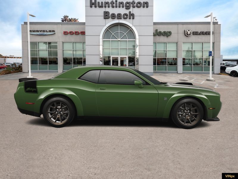 2023 Dodge Challenger R/T Scat Pack Swinger Special Edition in a F8 Green exterior color and Blackinterior. BEACH BLVD OF CARS beachblvdofcars.com 