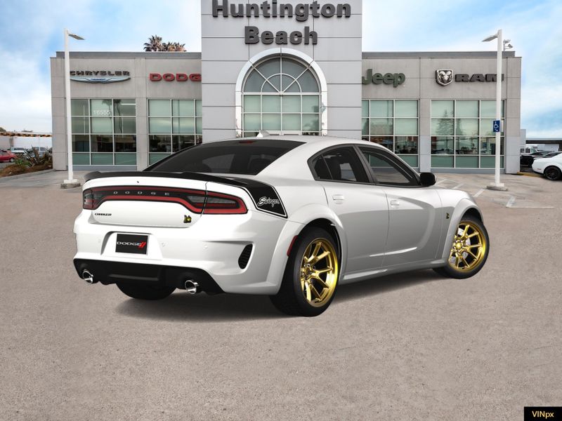 2023 Dodge Charger Scat Pack Widebody Swinger Special Edition in a White Knuckle exterior color and Blackinterior. BEACH BLVD OF CARS beachblvdofcars.com 