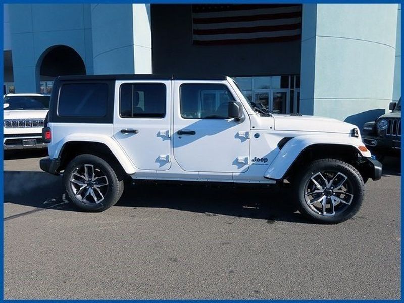2024 Jeep Wrangler 4xE Sport S 4xe in a Bright White Clear Coat exterior color and Blackinterior. Papas Jeep Ram In New Britain, CT 860-356-0523 papasjeepram.com 