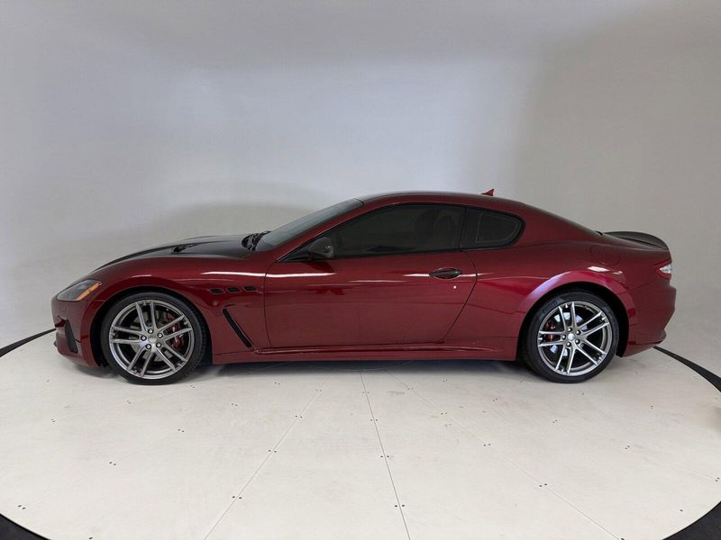 2018 Maserati GranTurismo MC in a Rosso Trionfale Metallic exterior color and Bianco Pregiatointerior. Karma Newport Beach (844) 527-6262 karmanb.com 