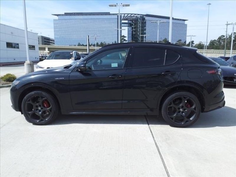 2024 Alfa Romeo Stelvio Veloce in a Vulcano Black Metallic exterior color and Blackinterior. Northside Imports Houston 281-475-4549 northsideimportshouston.com 