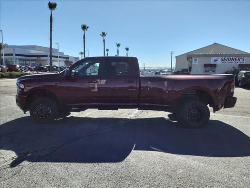 2024 RAM 3500 Big Horn in a Delmonico Red Pearl Coat exterior color and Blackinterior. Perris Valley Auto Center 951-657-6100 perrisvalleyautocenter.com 