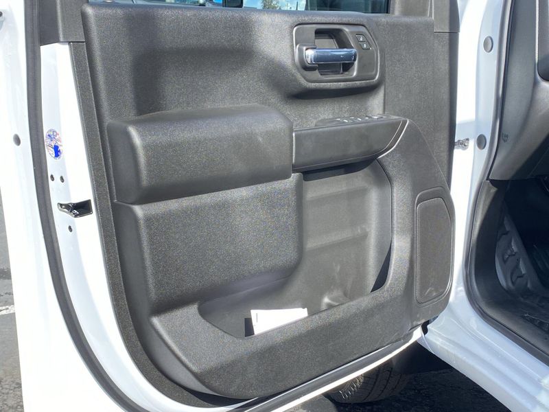 2024 Chevrolet Silverado 3500HD CC Work Truck in a Summit White exterior color and Jet Blackinterior. BEACH BLVD OF CARS beachblvdofcars.com 