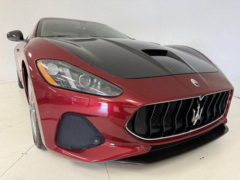 2018 Maserati GranTurismo MC in a Rosso Trionfale Metallic exterior color and Bianco Pregiatointerior. Karma Newport Beach (844) 527-6262 karmanb.com 