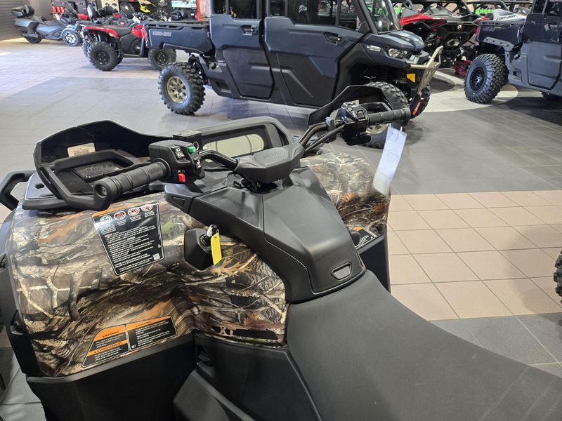 2025 CAN-AM OUTLANDER MAX XT 1000 WILDLAND CAMO  in a WILDLAND CAMO exterior color. Family PowerSports (877) 886-1997 familypowersports.com 