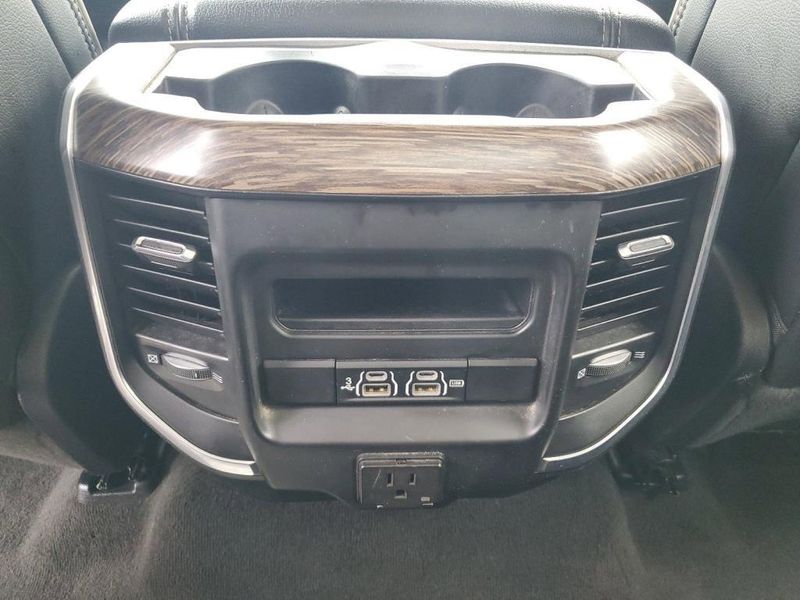 2020 RAM 1500 Laramie in a Bright White Clear Coat exterior color and Blackinterior. Johnson Dodge 601-693-6343 pixelmotiondemo.com 