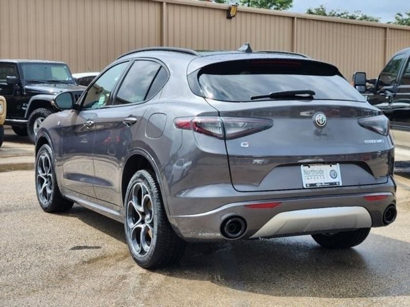 2024 Alfa Romeo Stelvio Ti in a Vesuvio Gray Metallic exterior color and Blackinterior. Northside Imports Houston 281-475-4549 northsideimportshouston.com 