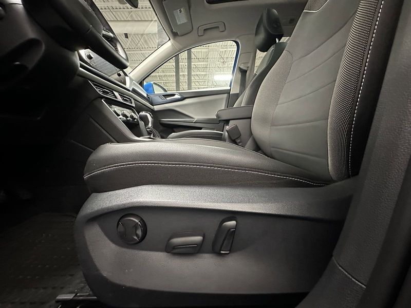 2023 Volkswagen Taos SE AWD w/Sunroof in a Cornflower Blue exterior color and Black Heated Seatsinterior. Schmelz Countryside Alfa Romeo and Fiat (651) 968-0556 schmelzfiat.com 