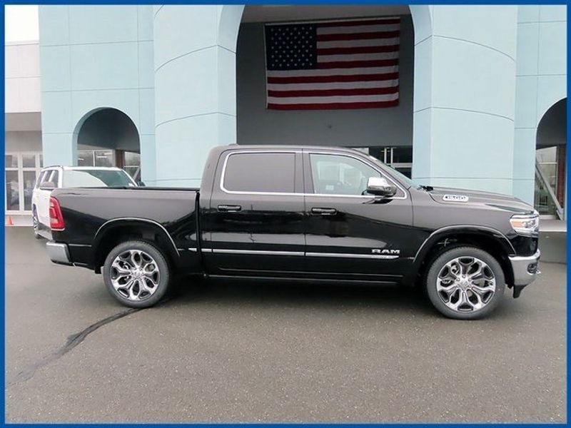 2024 RAM 1500 Limited in a Diamond Black Crystal Pearl Coat exterior color and Blackinterior. Papas Jeep Ram In New Britain, CT 860-356-0523 papasjeepram.com 