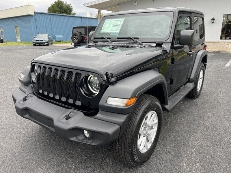 2023 Jeep Wrangler 2-door Sport S 4x4 in a Black Clear Coat exterior color and Blackinterior. Lakeshore CDJR Seaford 302-213-6058 lakeshorecdjr.com 