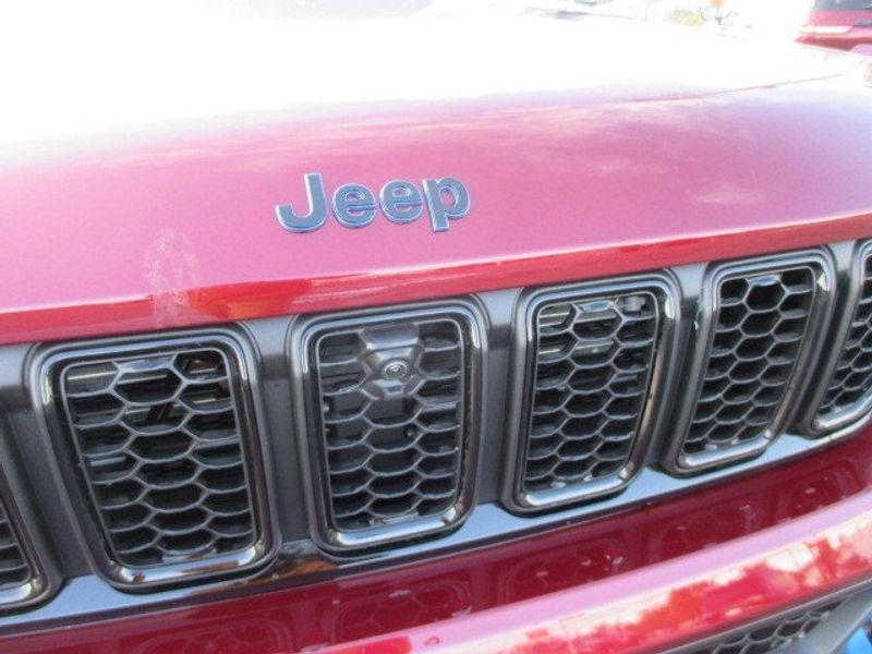 2023 Jeep Grand Cherokee 30th Anniversary 4xe in a Velvet Red Pearl Coat exterior color and Global Blackinterior. Oak Harbor Motors Inc. 360-323-6434 ohmotors.com 