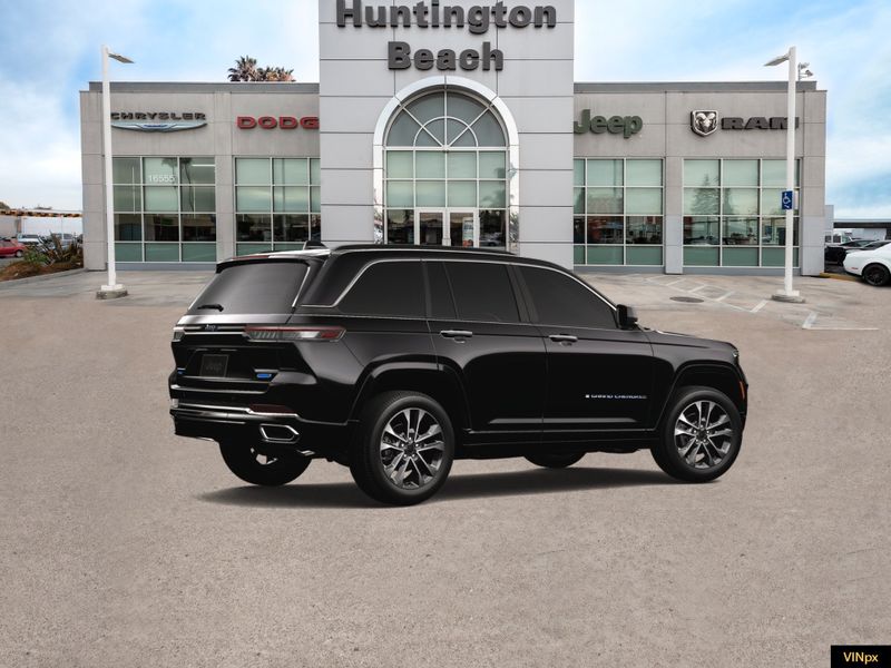 2023 Jeep Grand Cherokee 4xe Overland 4x4 in a Diamond Black Crystal Pearl Coat exterior color and Global Blackinterior. BEACH BLVD OF CARS beachblvdofcars.com 