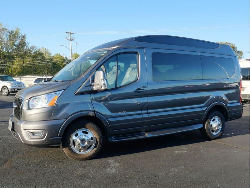 2021 Ford Transit-150 Cargo Van  in a Carbonized Gray Metallic exterior color and Graphiteinterior. Paul Sherry Chrysler Dodge Jeep RAM (937) 749-7061 sherrychrysler.net 