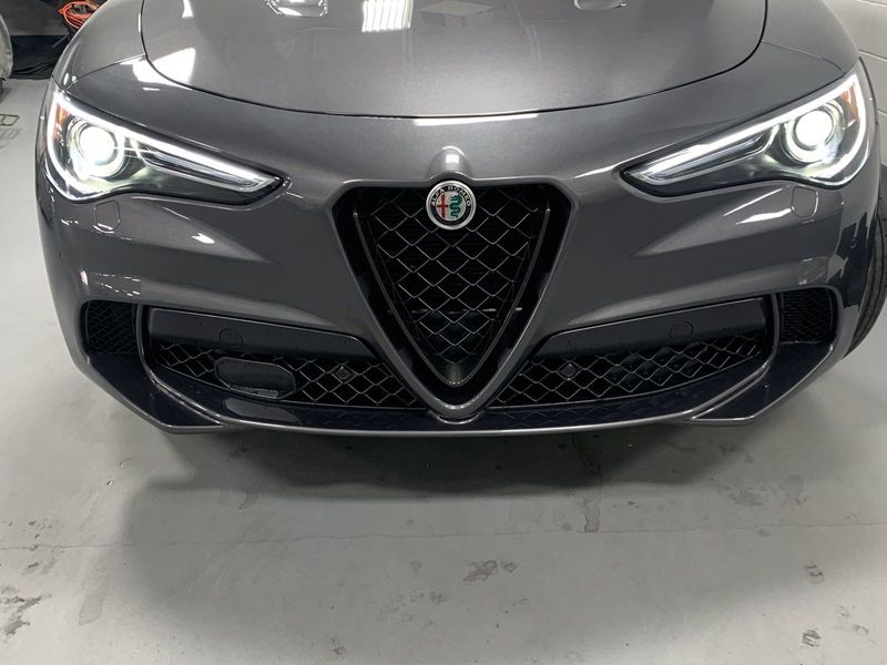 2023 Alfa Romeo Stelvio Quadrifoglio Awd in a Vesuvio Gray Metallic exterior color and Black Heated Sport Leatherinterior. Schmelz Countryside Alfa Romeo (651) 867-3222 schmelzalfaromeo.com 