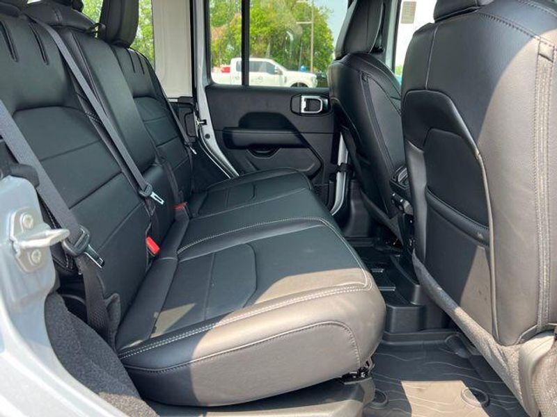 2023 Jeep Wrangler Sahara 4xe in a Silver Zynith Clear Coat exterior color and Blackinterior. Lakeshore CDJR Seaford 302-213-6058 lakeshorecdjr.com 