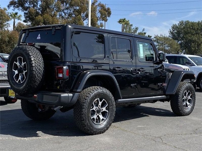 2023 Jeep Wrangler 4-door Rubicon 4x4 in a Black Clear Coat exterior color and Blackinterior. McPeek