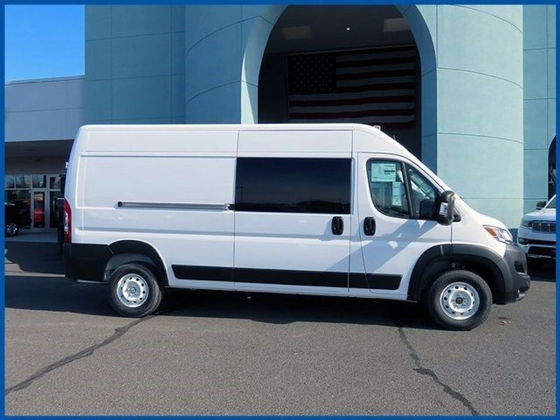 2023 RAM ProMaster High Roof in a Bright White Clear Coat exterior color and Blackinterior. Papas Jeep Ram In New Britain, CT 860-356-0523 papasjeepram.com 