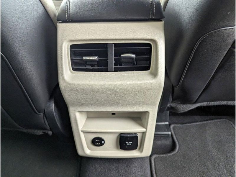 2022 Ford Edge Titanium in a Carbonized Gray Metallic exterior color and Medium Soft Ceramicinterior. Johnson Dodge 601-693-6343 pixelmotiondemo.com 