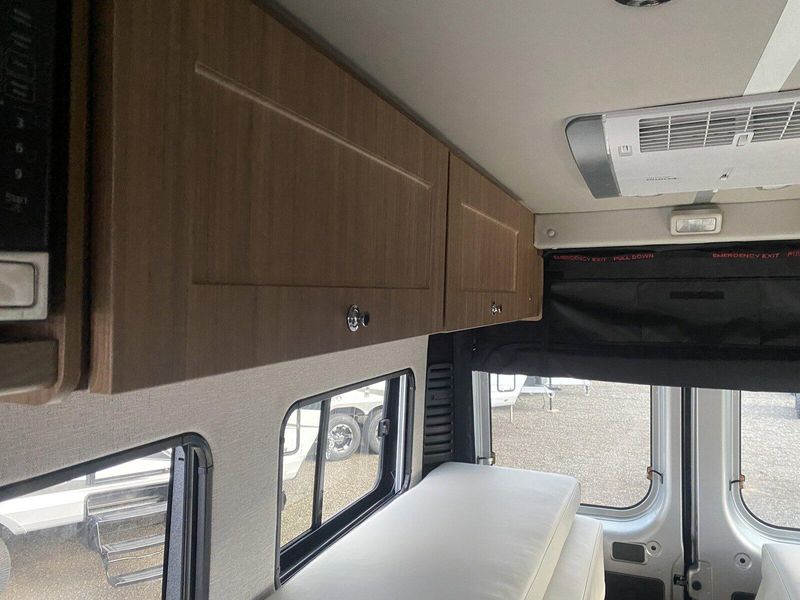 2024 ROADTREK Pivot  in a Silver Metallic exterior color and Chestnut Browninterior. Legacy Powersports 541-663-1111 legacypowersports.net 