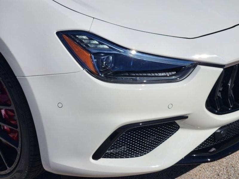 2024 Maserati Ghibli Modena in a White exterior color and Black/Redinterior. Northside Imports Houston 281-475-4549 northsideimportshouston.com 