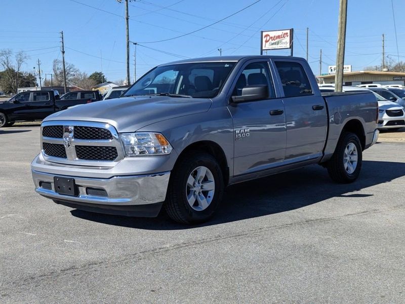 2022 RAM 1500 Classic SLT in a Billet Silver Metallic Clear Coat exterior color and Diesel Gray/Blackinterior. Johnson Dodge 601-693-6343 pixelmotiondemo.com 
